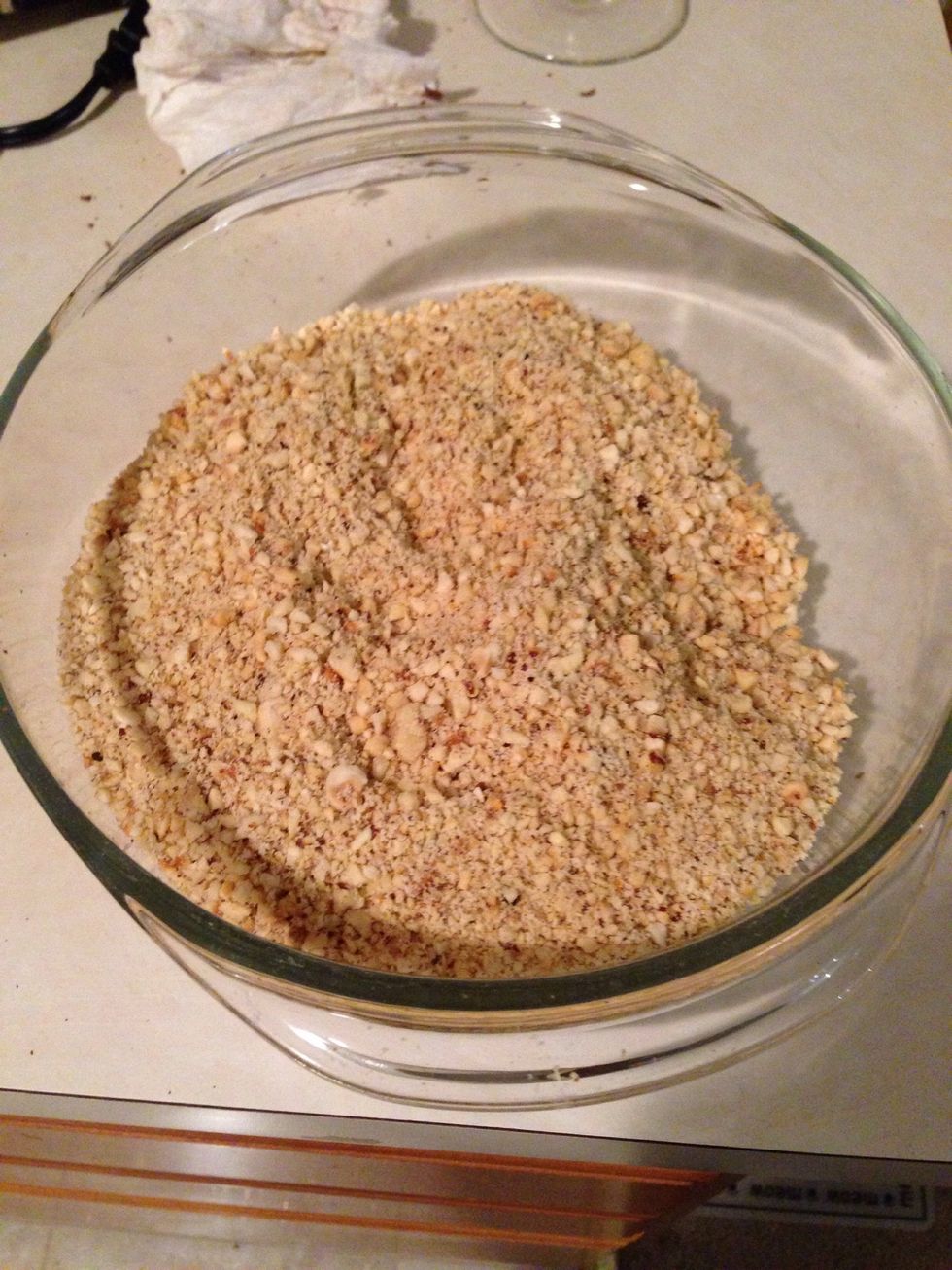 Stick them in a food processor and use the pulse blend to chop them into pieces. You can use a knife if you don't have a food processor but it will take longer