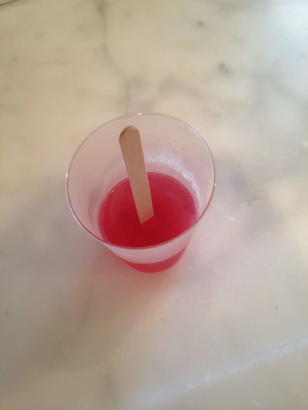 Stick your Popsicle stick in the center