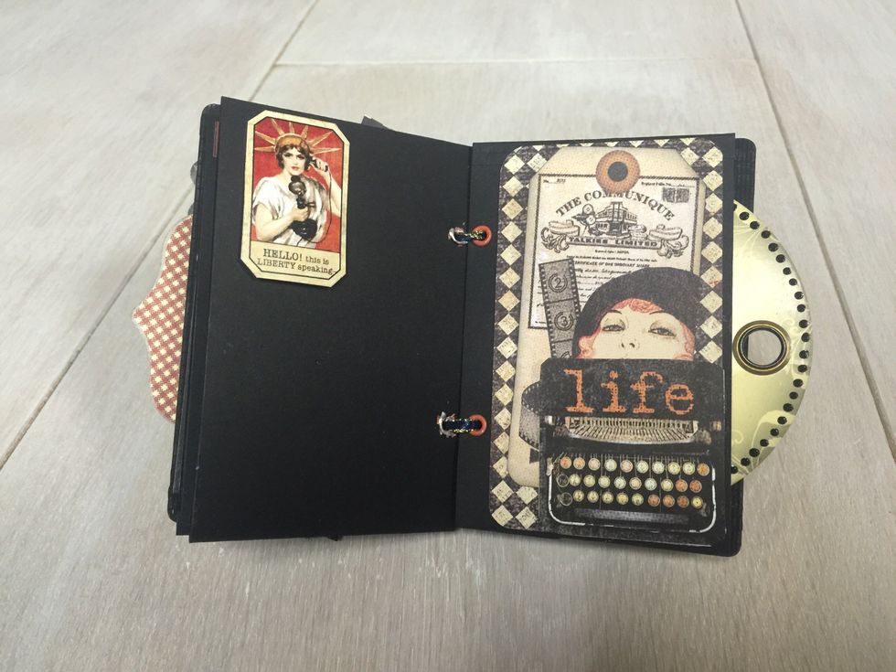 Sticker devote on left and Typewriter corner pocket to hold photo mat on the right.