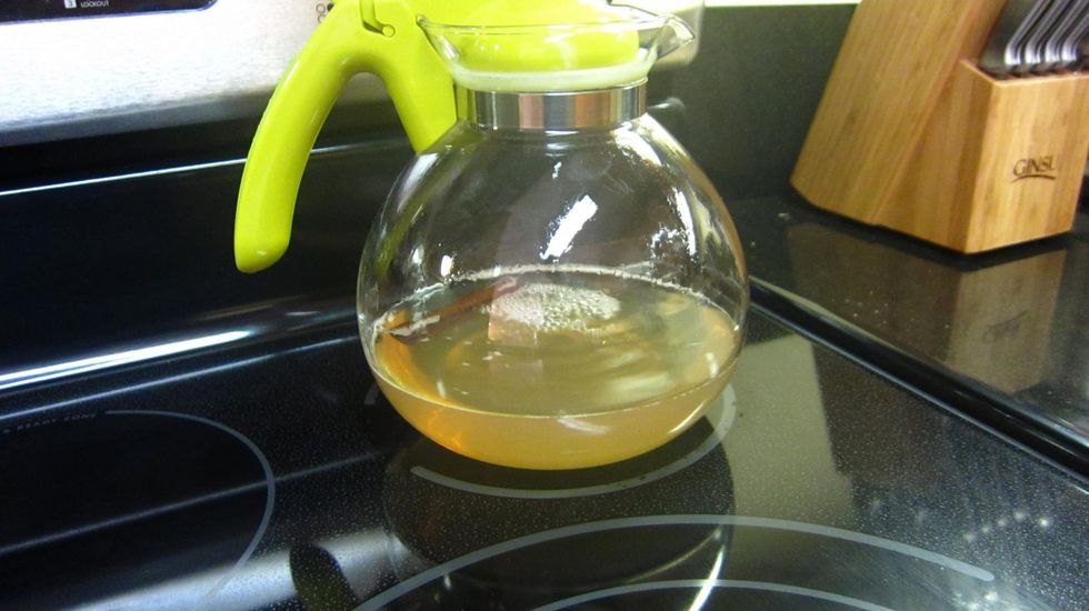 Still a pale yellow. You need to let it sit for 15-20minutes. As the temperature drops, the Cinnamon stick will suddenly release all that is good about Ceylon Cinnamon, changing the color to a red.
