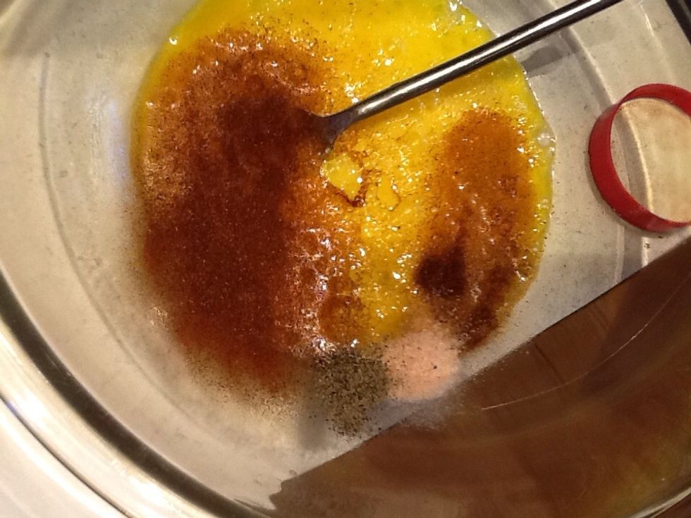 Stir 4 eggs in bowl, add salt, pepper, & chili powder.