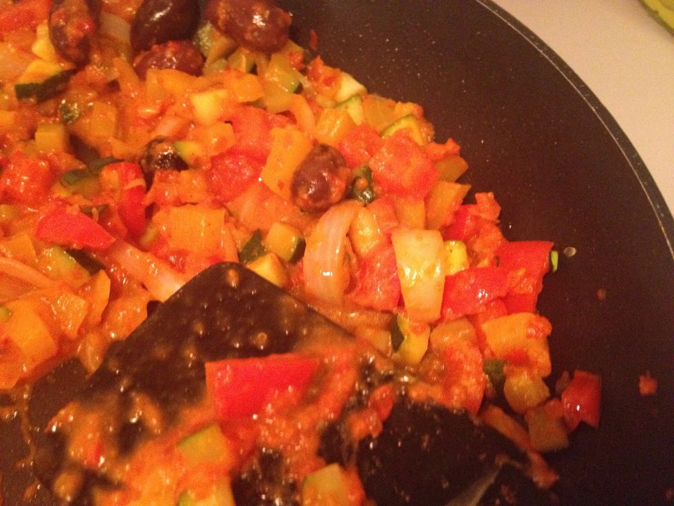 Stir again and see to that the veggies and olives are warm.