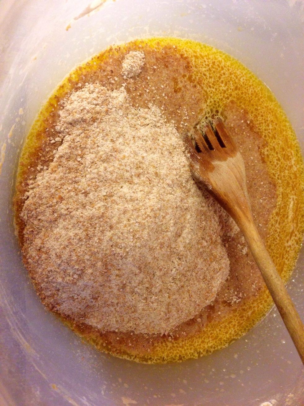 Stir again and start adding the graham flour.