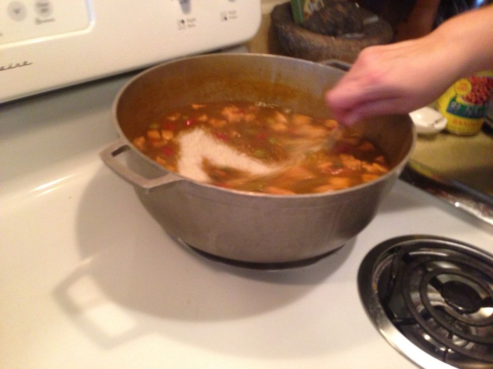 Stir again flip the bottom of the rice so it doesn't stick to the bottom of the pan
