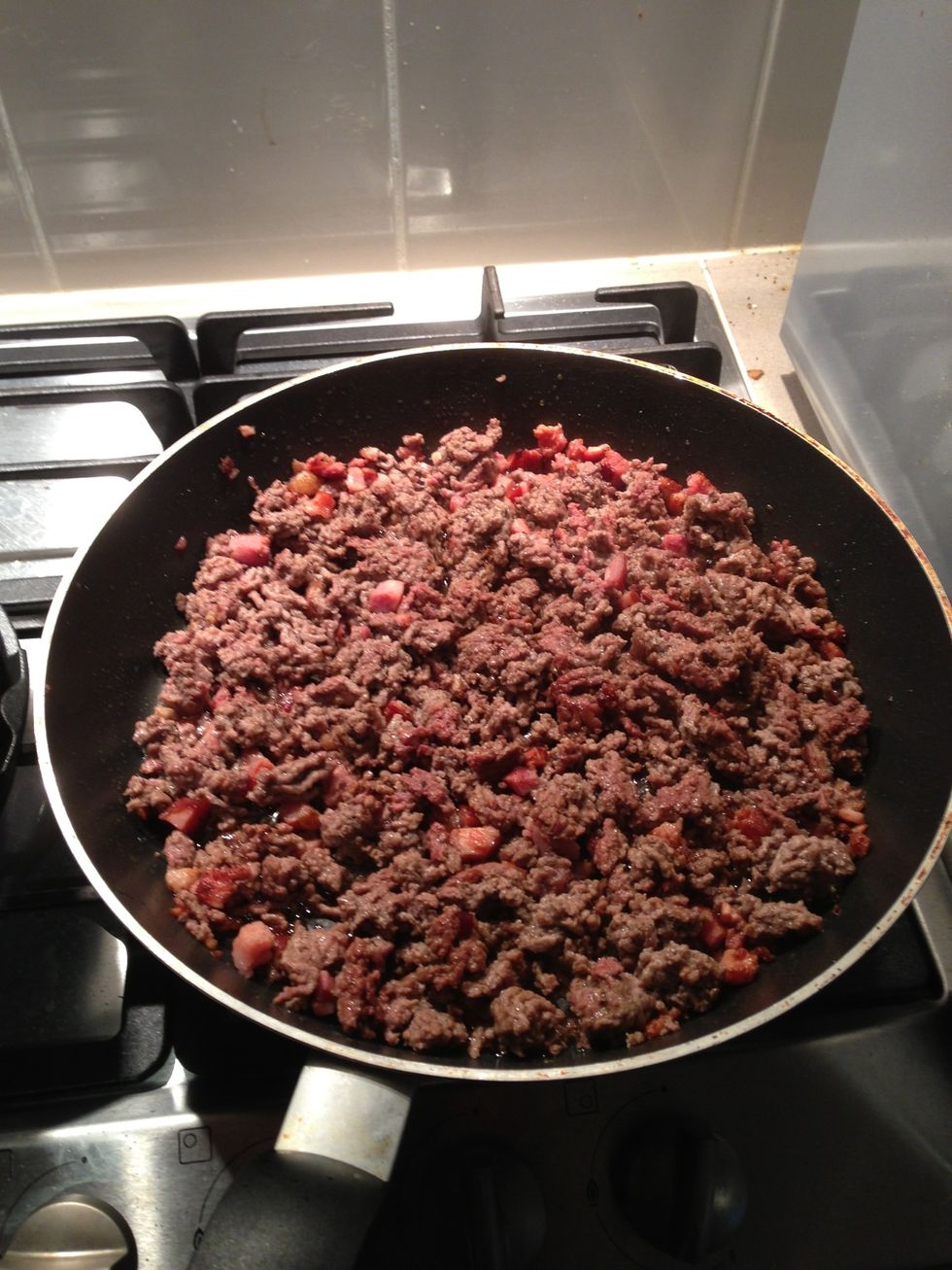 Stir all the ingredients in the fry pan so the beef stock is mixed in well
