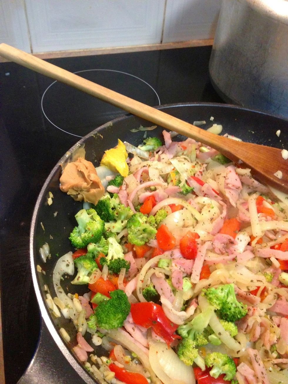Stir and mix in for a while and add, English mustard, peanut butter, honey and herbs. Stir in.