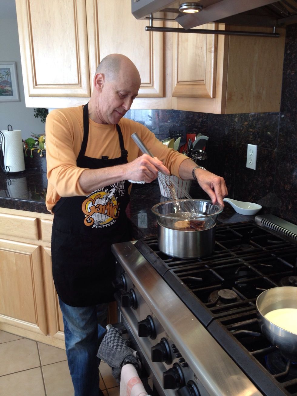 Stir as the chocolate melts.