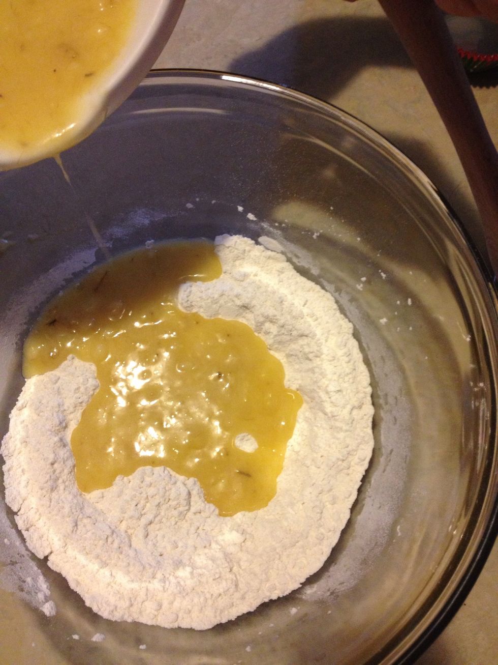 Stir banana mixture into flour mixture until moistened.