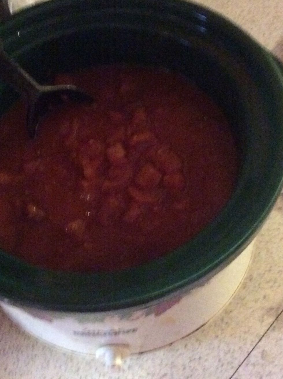 Stir beans and diced tomatoes