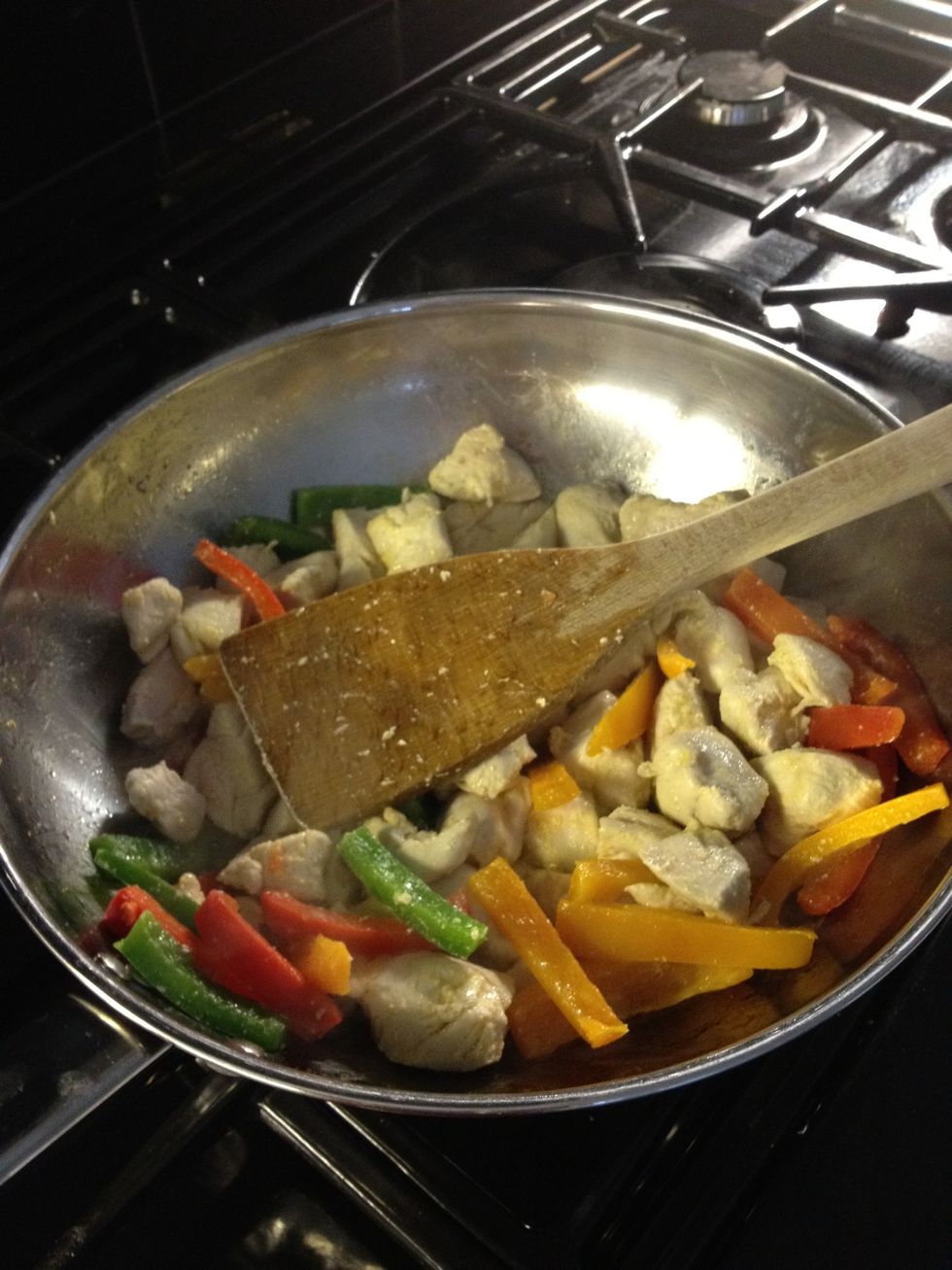 Stir contents until chicken is thoroughly cooked