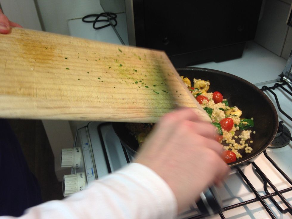 Stir cous cous in and add parsley