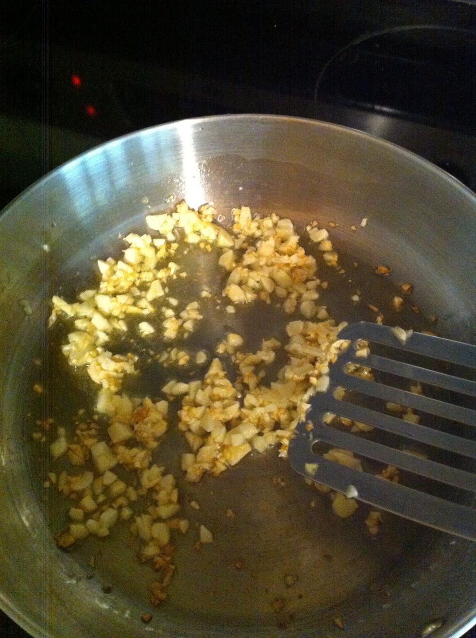 Stir every minute until garlic is lightly browned