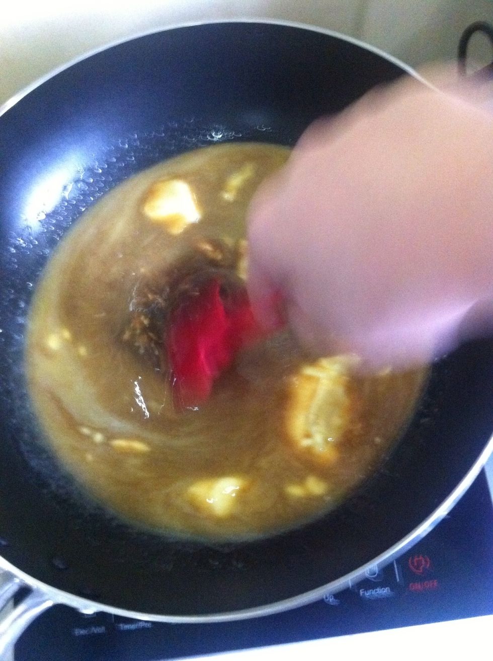 Stir for 5 mins or until chocolate melts and mixture is smooth.