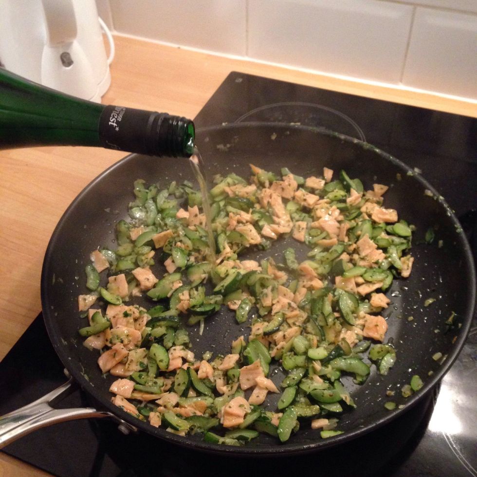 Stir fry for 2-3 minutes and as the salmon is almost cooked add about 100ml of white wine