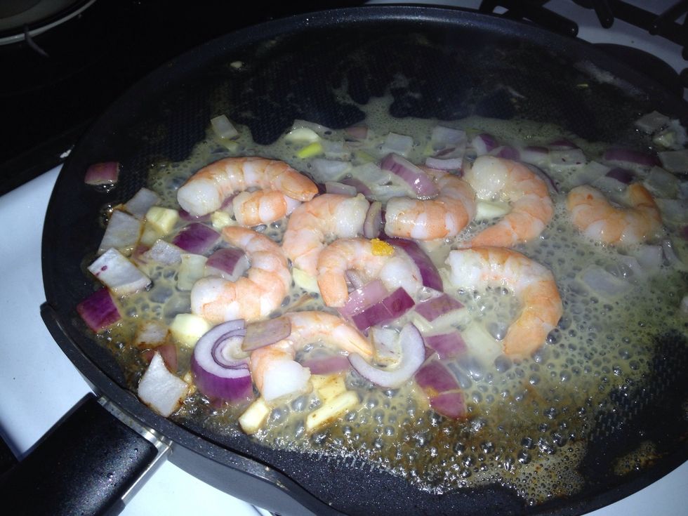 Stir fry the cooked shrimp and set aside.