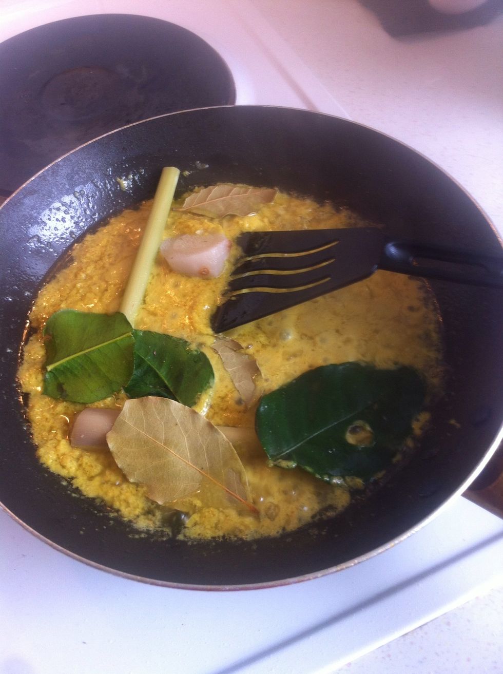 Stir fry the paste and leaves with 2tbs of oil. I recommend any type of oil other than olive oil