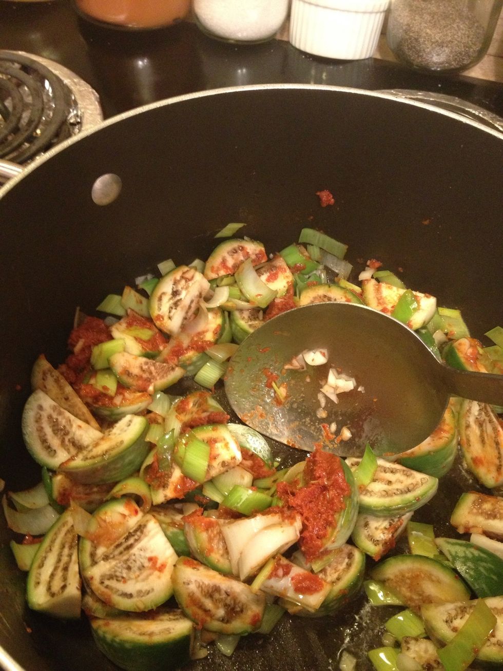 Stir fry the paste until everything is coated.