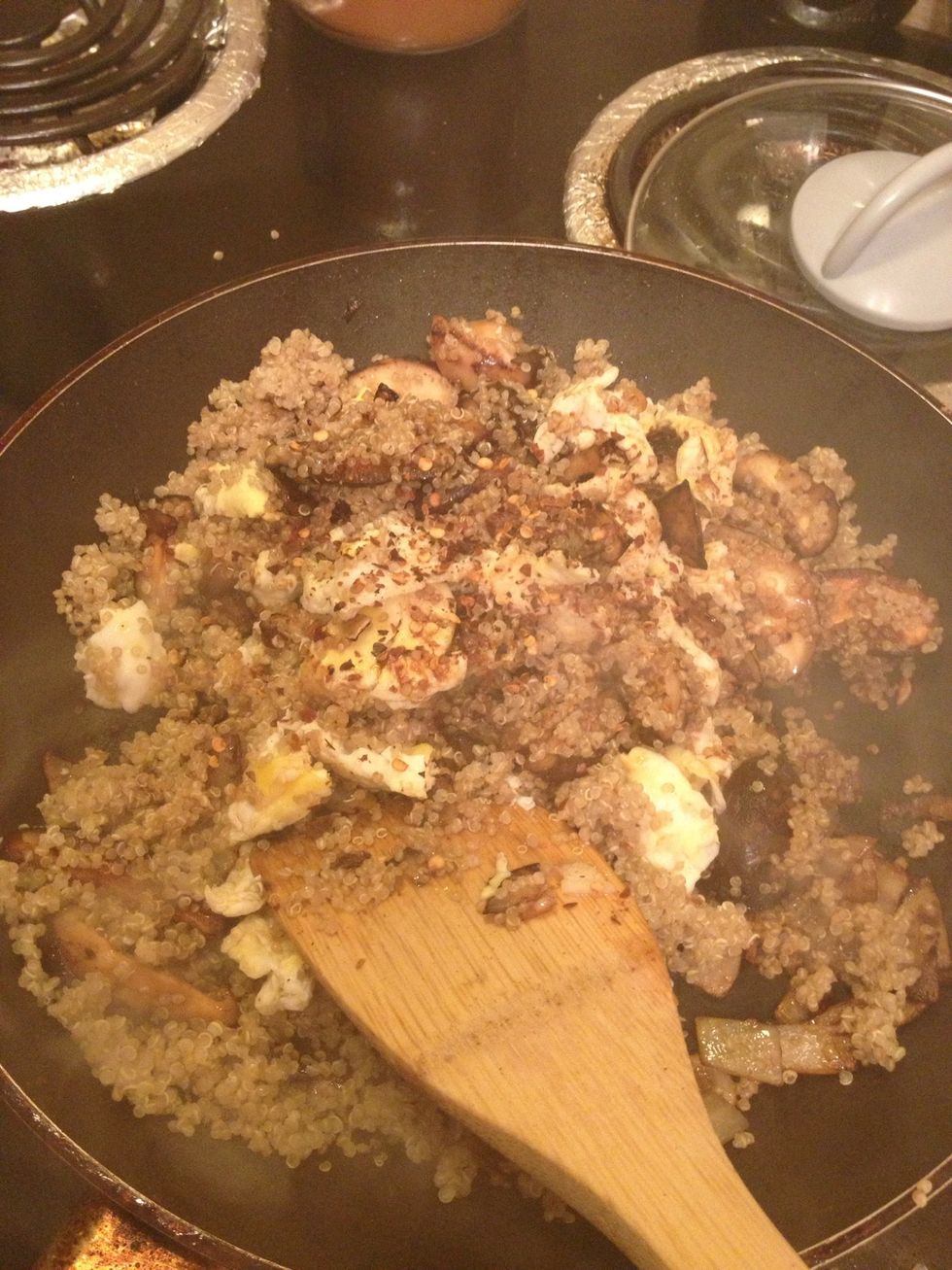 Stir fry the rice and mix well to ensure the egg and quinoa are evenly distributed. Now season and taste. I added roasted thai chili flakes. I love the heat!