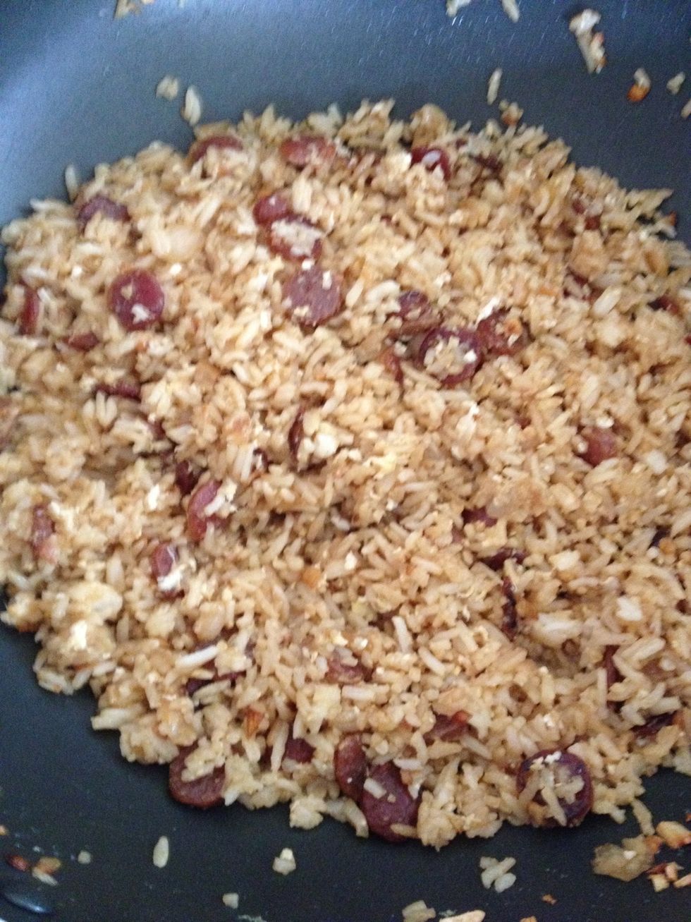 Stir fry the rice until they look dry and fluffy. By now the fragrance will start to fill the whole kitchen