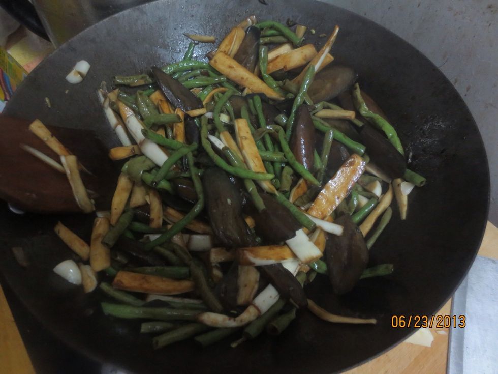 Stir fry until eggplant and beans are tender and soft