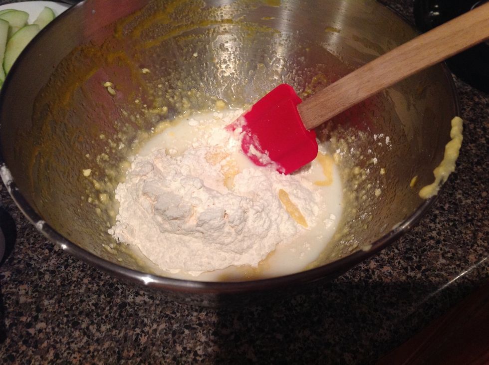 Stir half the flour and half the milk. Repeat with the remaining milk and flour.