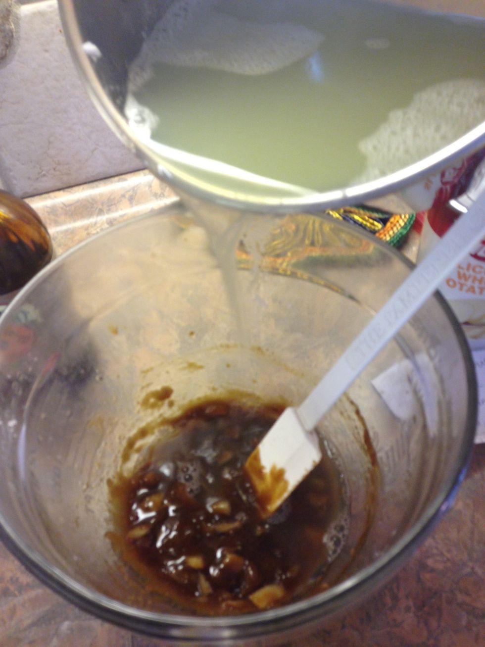 Stir in 1/2 - 1 cup bean liquid, saving some to add later during the baking time. It is tough for me to estimate exactly how much you need. I do it by sight. It should be pourable but not super runny.