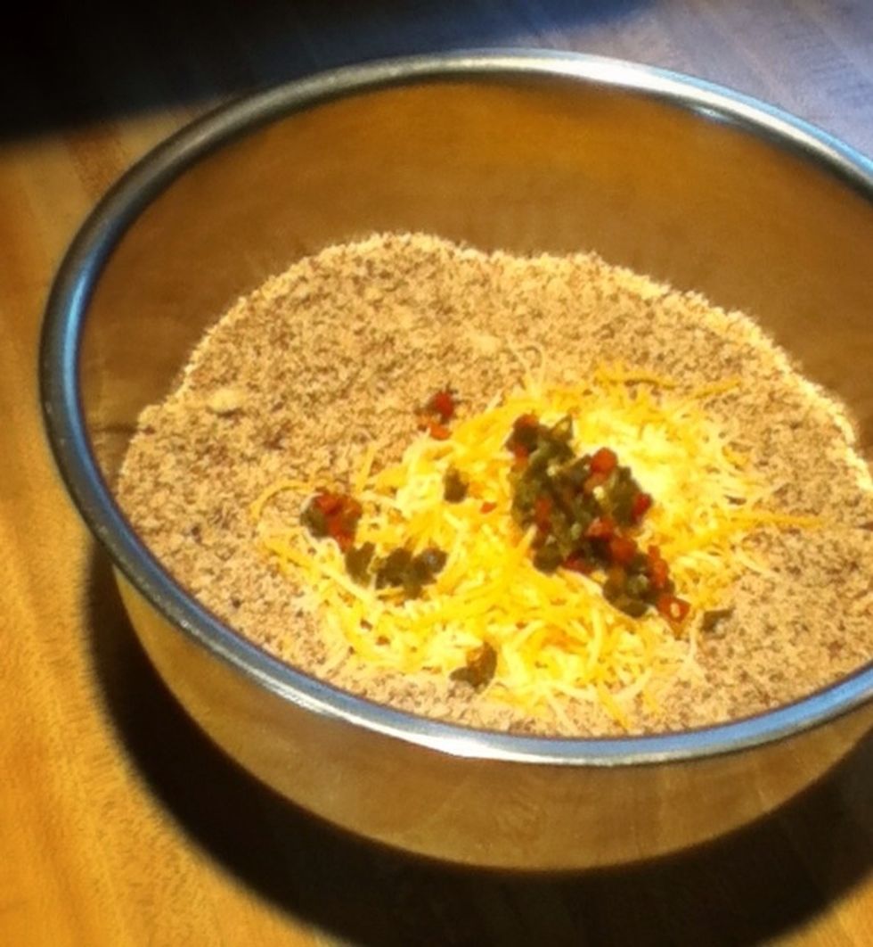 Stir in 1/2 cup of cheese and the peppers.