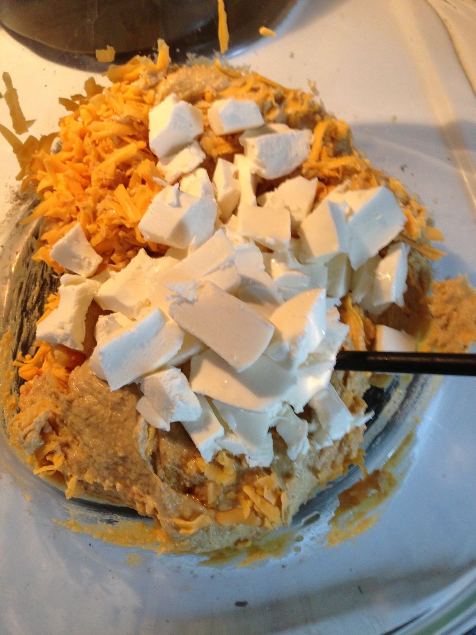 Stir in 1/2 lb fresh mozzarella.