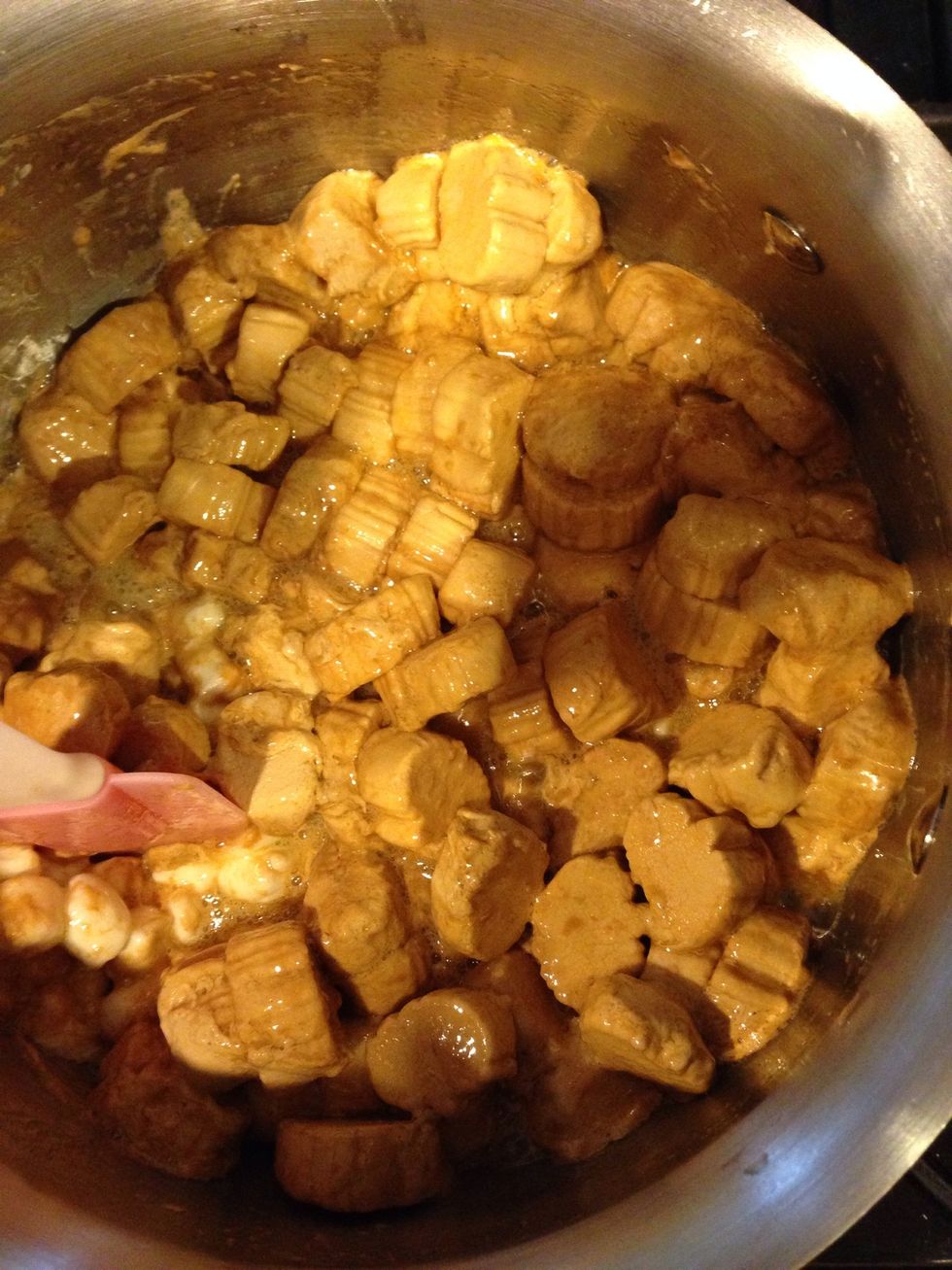 Stir in both kinda of marshmallows..