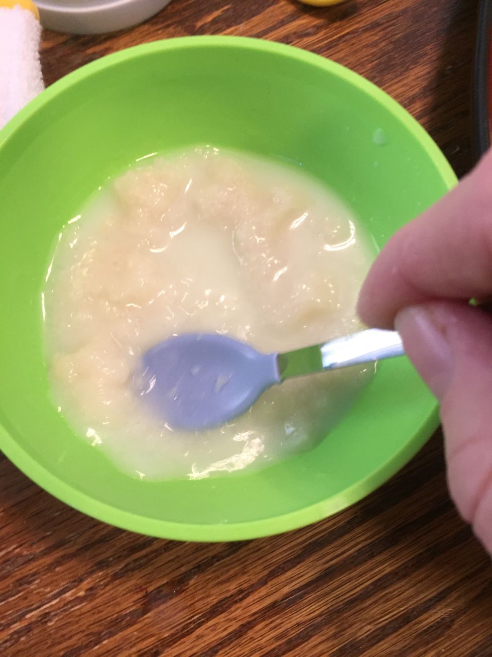 Stir in breastmilk or water until desired consistency