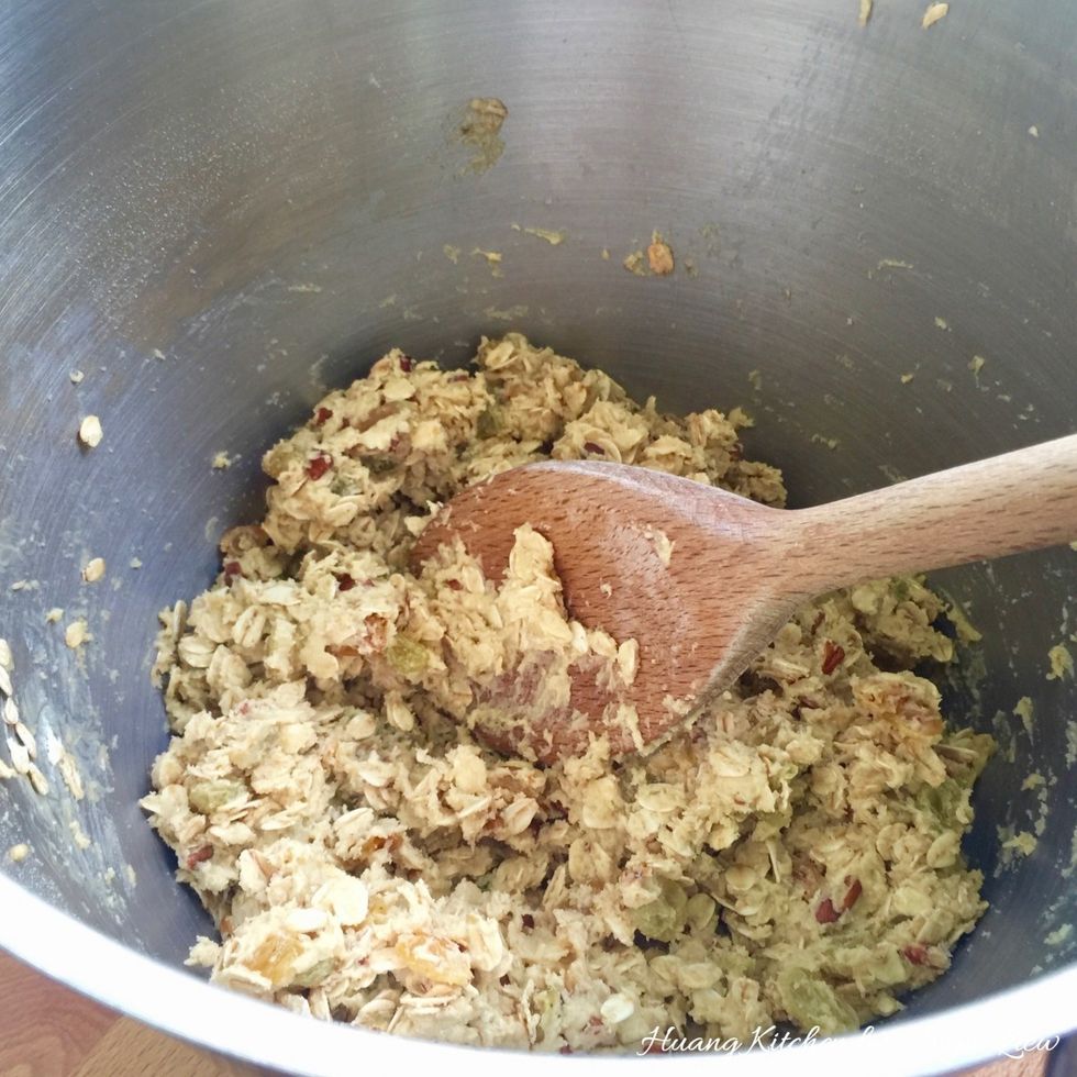 Stir in chopped pecans, rolled oats and raisins.