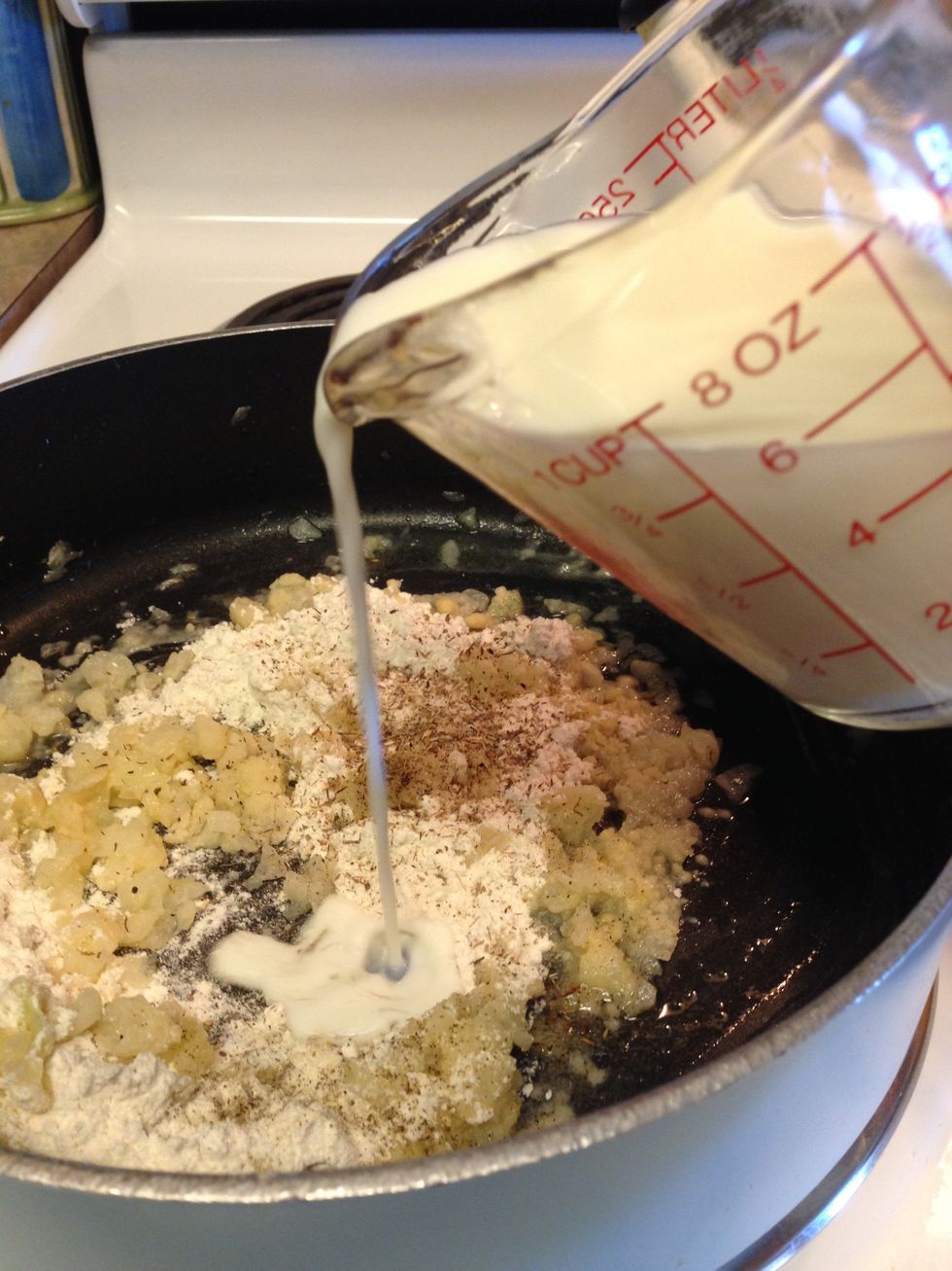 Stir in flour and seasoning until blended, then gradually stir in chicken broth and milk.