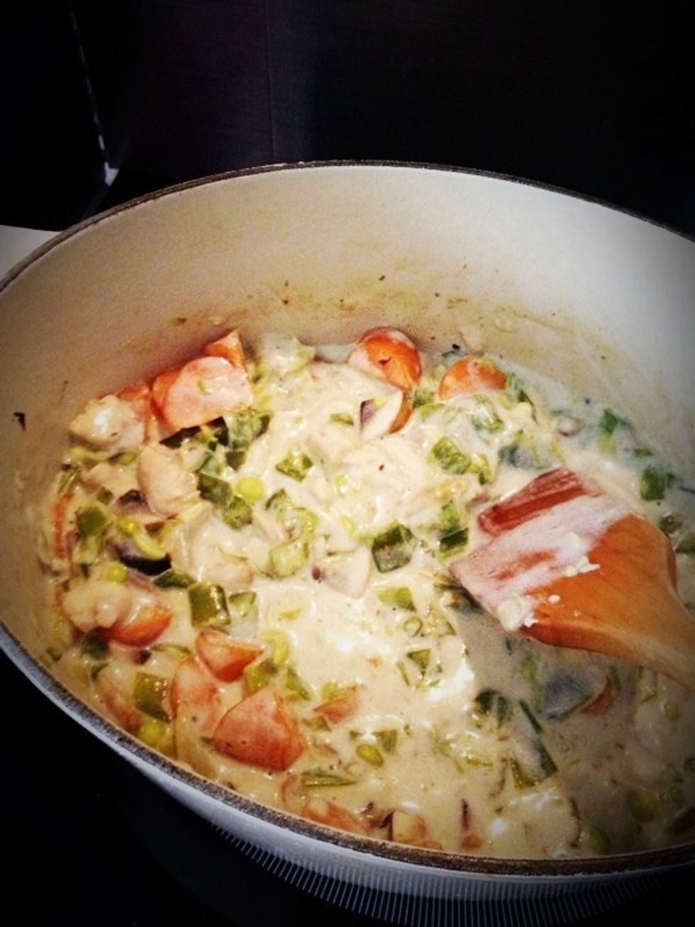 Stir in flour, salt & pepper. Stir in chicken broth and milk. Add the bay leave. Simmer over medium-low heat until thick. Remove from heat and set aside.