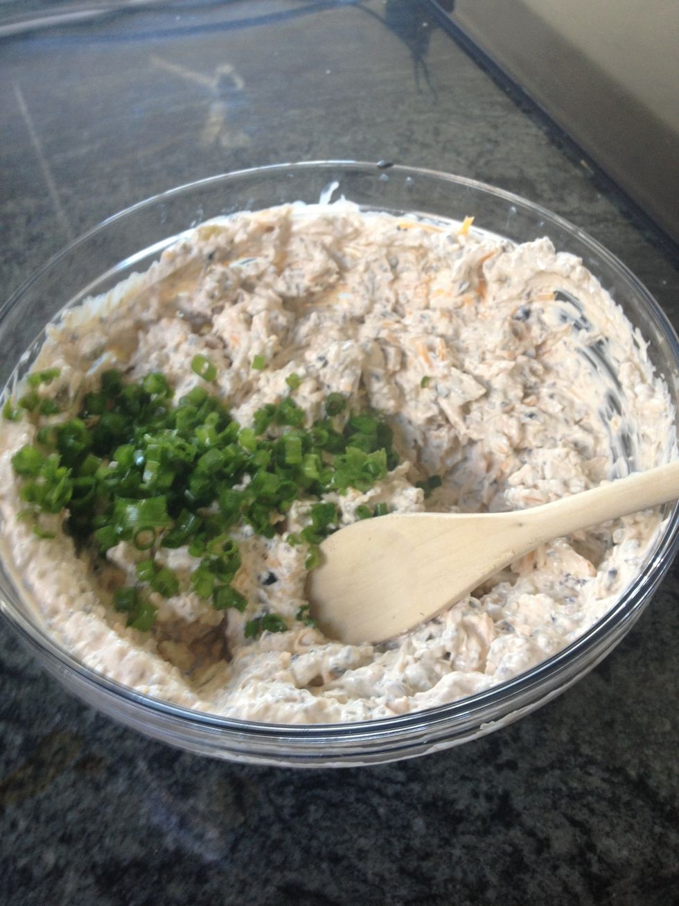 Stir in green onion with a spoon as they are delicate.