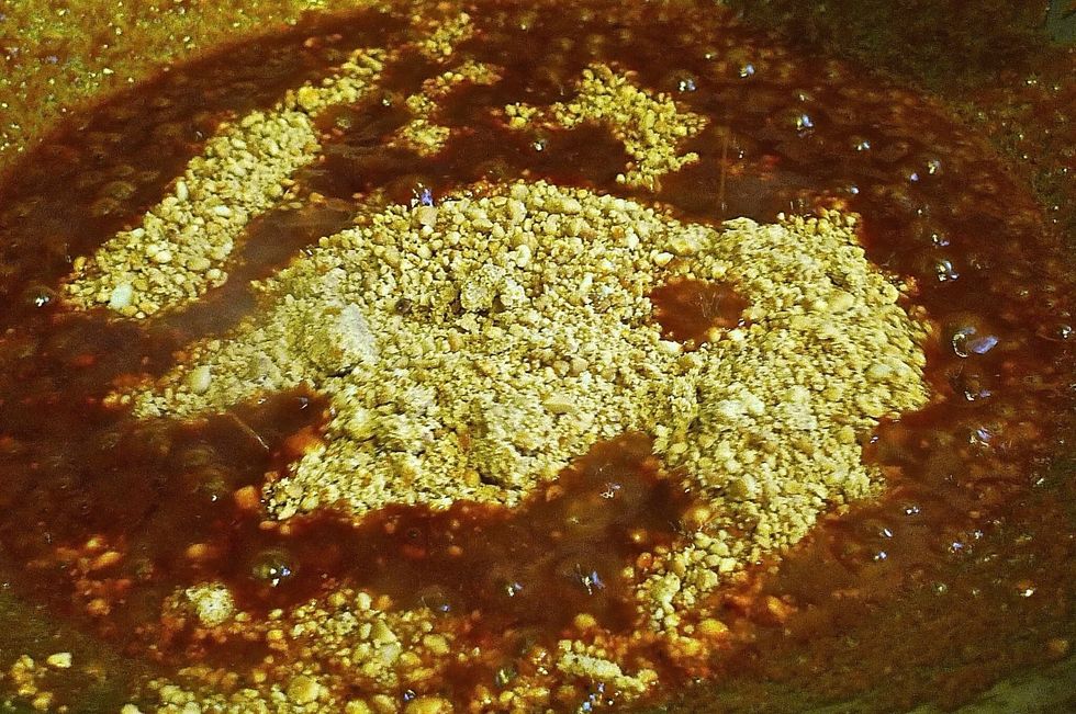 Stir in ground peanuts and mix thoroughly.