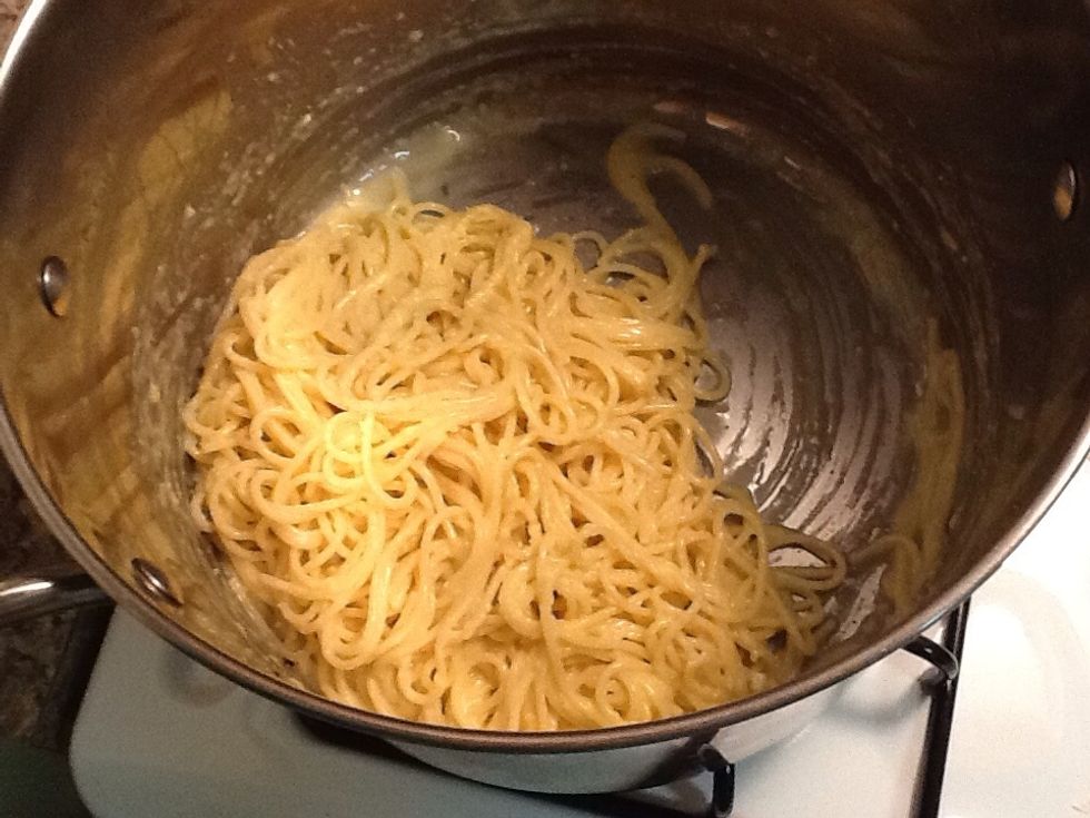 Stir in margarine, parmesan cheese and eggs, while spaghetti is hot.