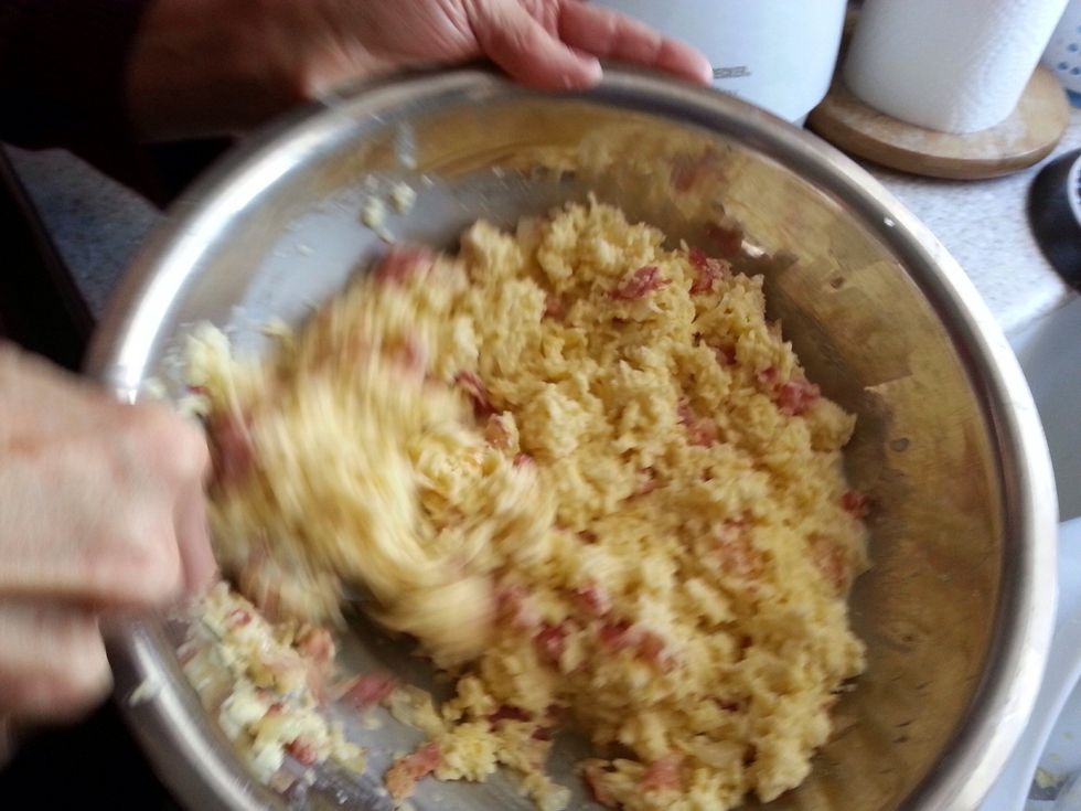 Stir in onions and bacon.