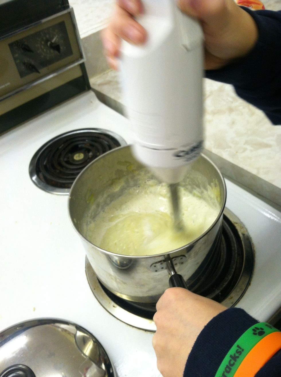Stir in salt, pepper and half and half
