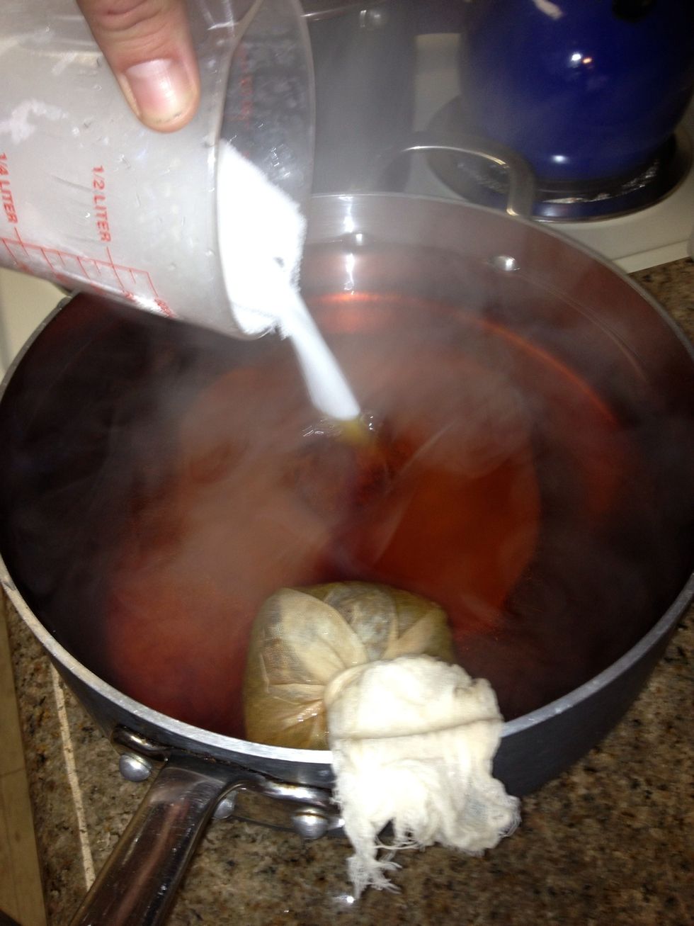 Stir in sugar & and steep for at least 10 min, I went for 30 min. The tannins that make tea bitter also make a good environment for the SCOBY. Let tea cool to room temp before proceeding.