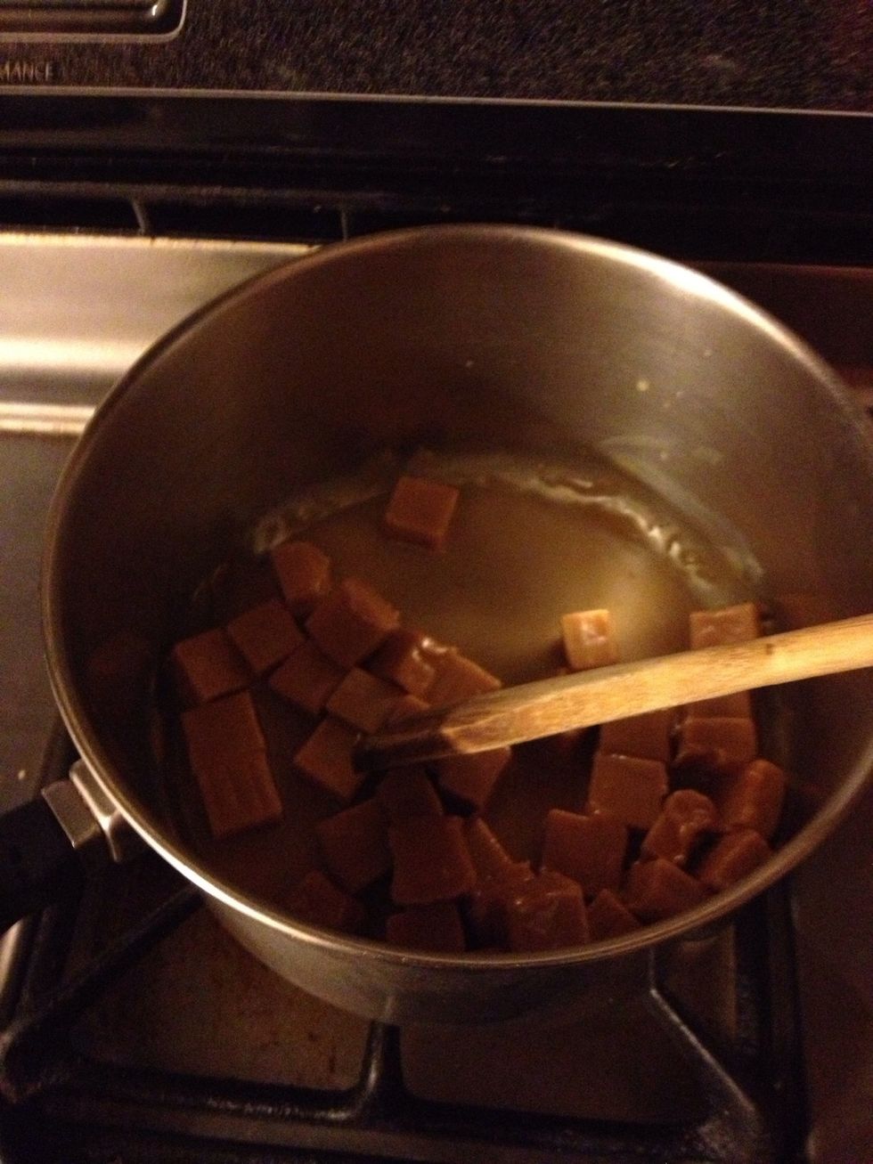 Stir in the Carmel. Keep checking on the Carmel so it does not burn. Stir constantly. My Carmel burned a little, but it still tasted good. Just do not burn the Carmel.