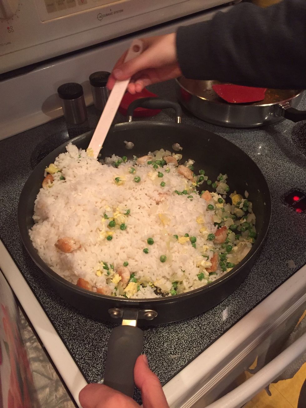 Stir in the cooked rice.