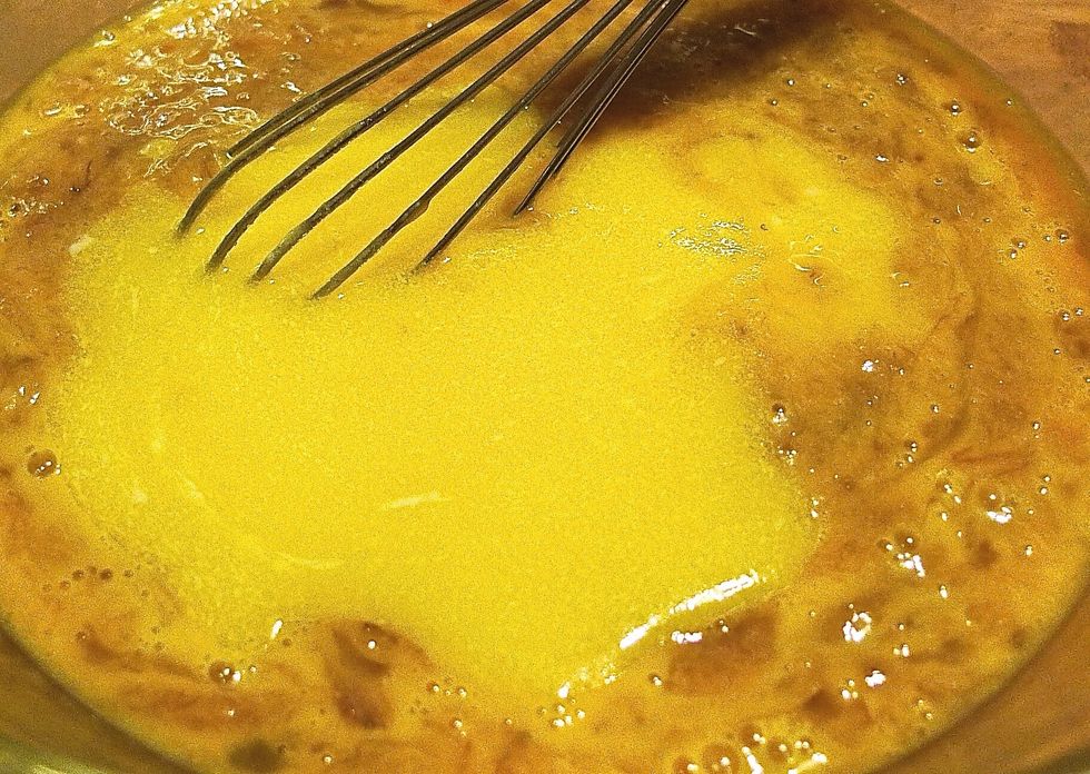 Stir in the cooled and melted butter.