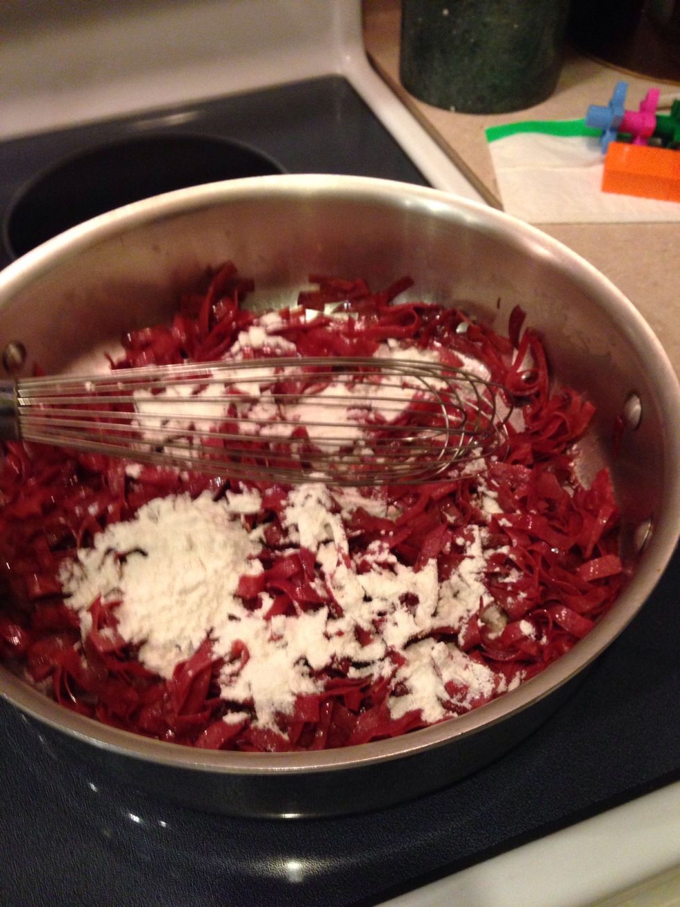 Stir in the flour and cook until it just begins to color, about 3 minutes.