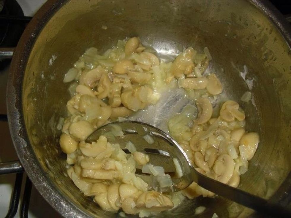 Stir in the flour and mix well, making sure all the mushrooms are well coated