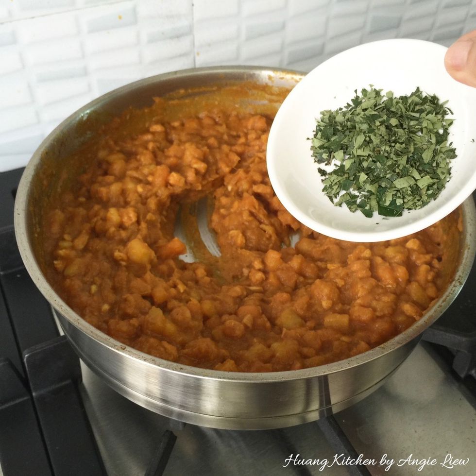 Stir in the minced curry leaves. And we're done with the curry puff's filling. Set aside to cool while you make the pastry for the curry puffs.