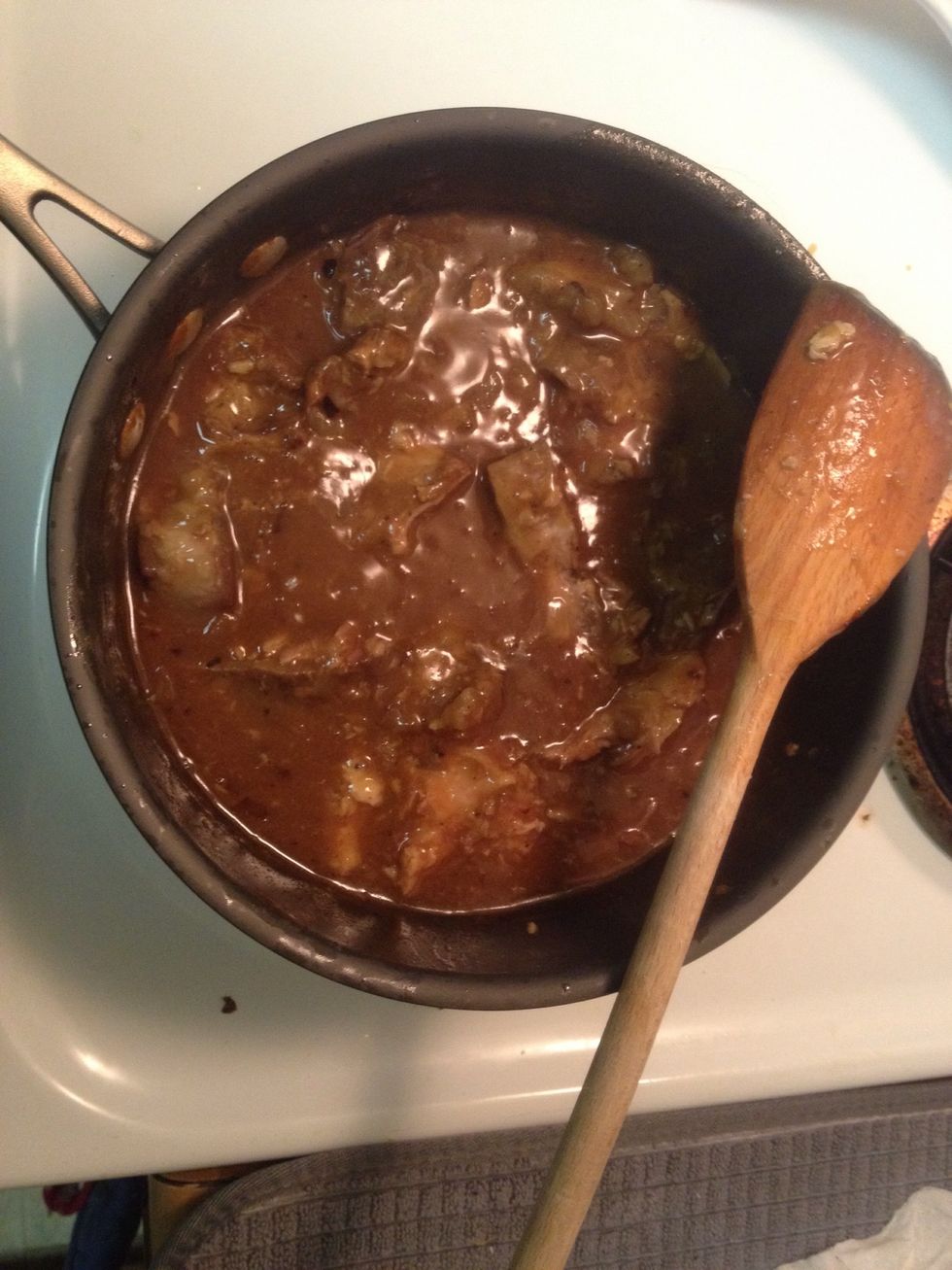 Stir in the pork, reduce heat until the gravy bubbles gently and cook until the pork is heated through