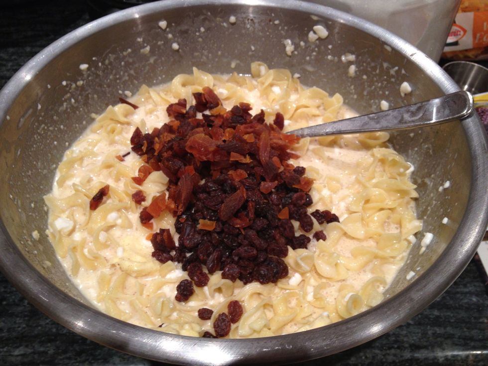 Stir in the raisins and chopped apricots.