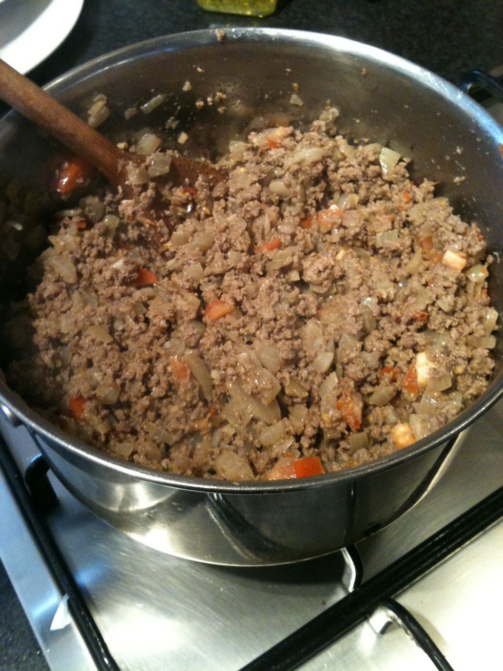 Stir in the tomatoes and cook till the tomatoes are soft. About 2-3 minutes again stirring to avoid burning.