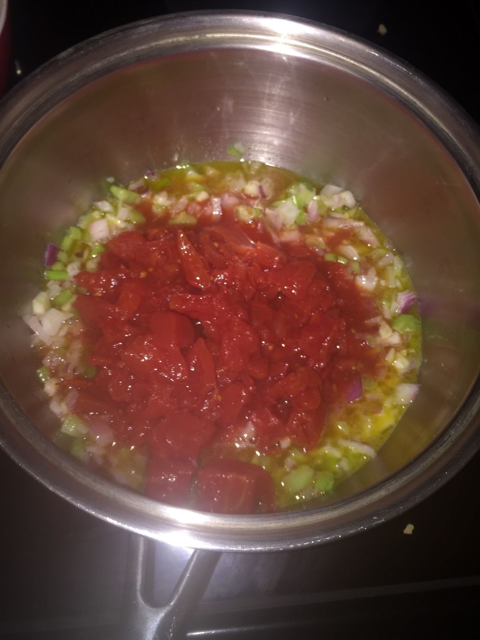 Stir in the tomatoes