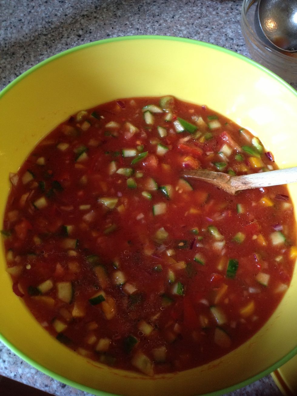 Stir in tomato juice, olive oil and white wine vinegar. Taste if it needs a bit more vinegar to balance the taste. Add salt,pepper and sugar to taste. Place in the fridge for 2-3 hours before serving
